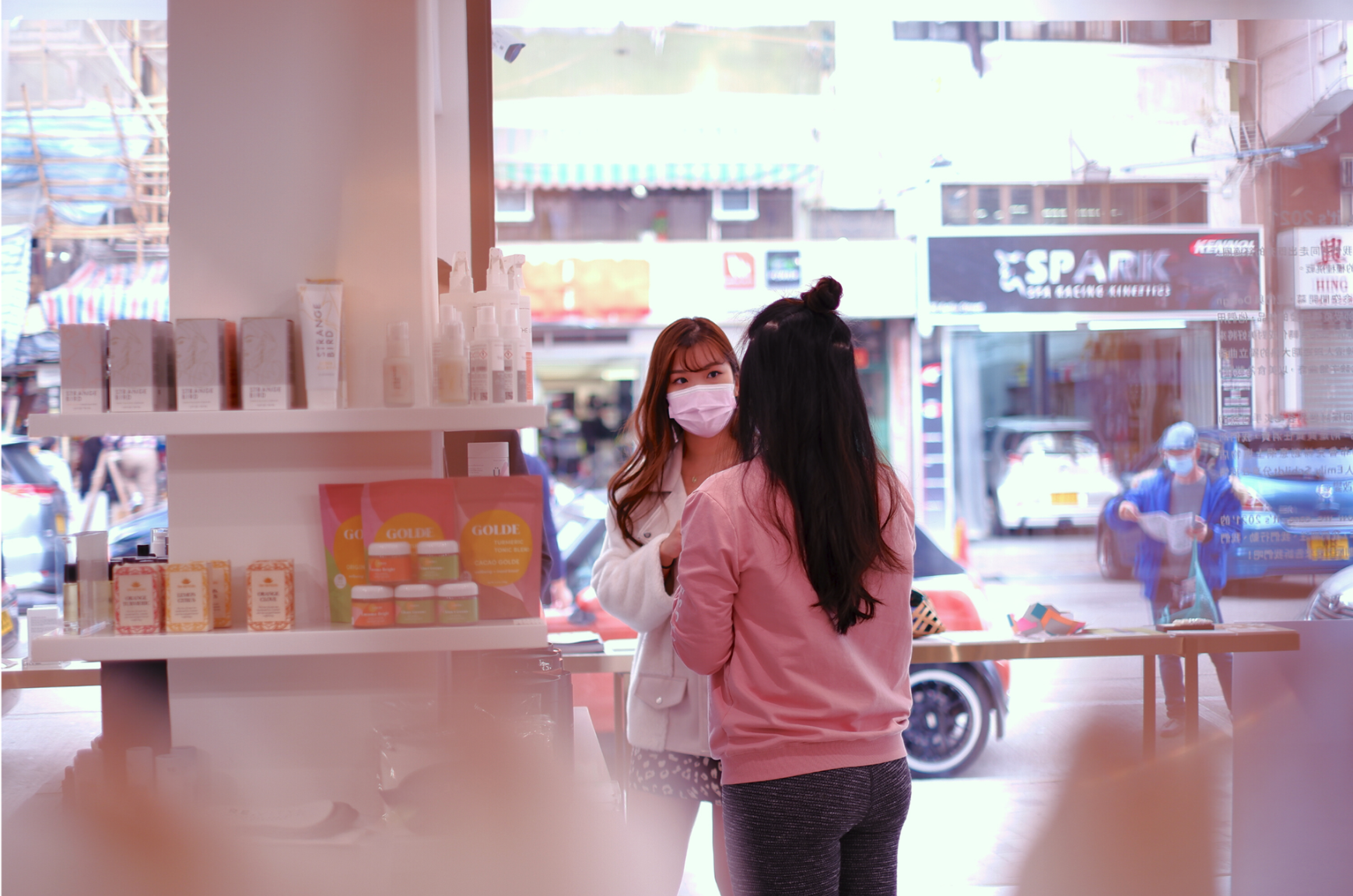 Customers inside the WSNXT store browsing curated wellness and design products